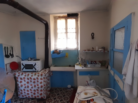 Andros-Apikia. House 280.49 m2 on 835.44 m2 land, with irrigation water, cistern and seaview.