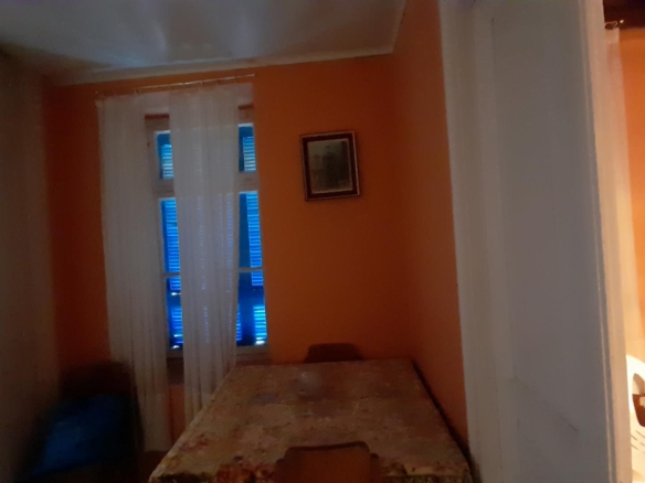 Andros-Apikia. House 280.49 m2 on 835.44 m2 land, with irrigation water, cistern and seaview.