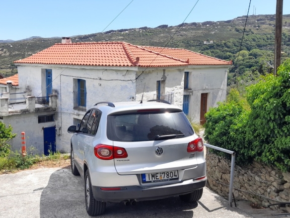 Andros-Apikia. House 280.49 m2 on 835.44 m2 land, with irrigation water, cistern and seaview.