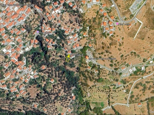 Στενιές. Οικόπεδο 232 m2 οικοδομήσιμο με οπωροφόρα δένδρα και ποτιστικό νερό